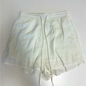 Princess Polly White linen shorts.